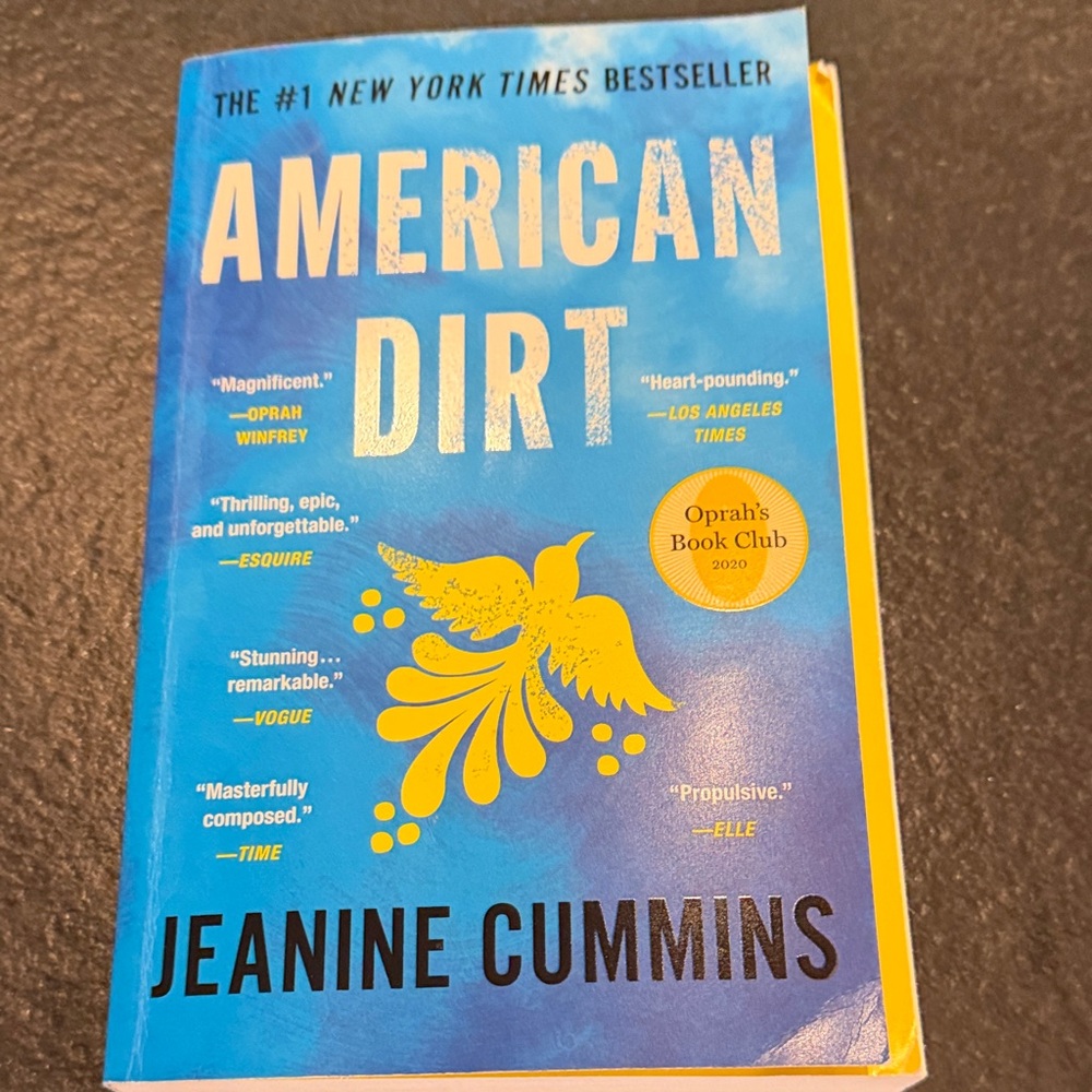 American Dirt by Jeanine Cummins - Blue and Yellow Cover